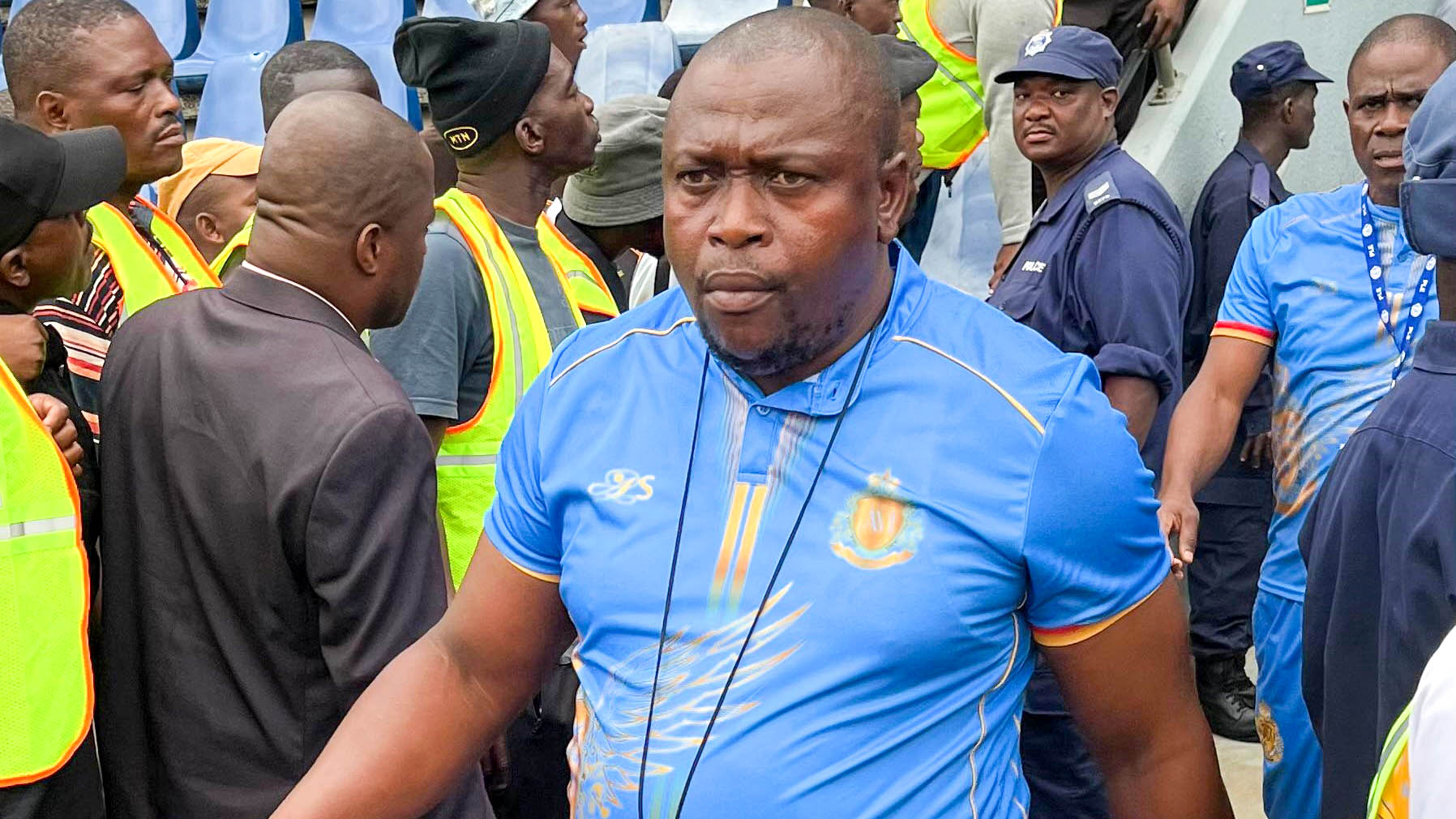 Former Mbabane Highlanders Coach Ernest Mavuso walks out of the tunnel followed by Sifiso 'Barnes' Mkhulisi. The duo are alleged to have taken the team to CMAC.